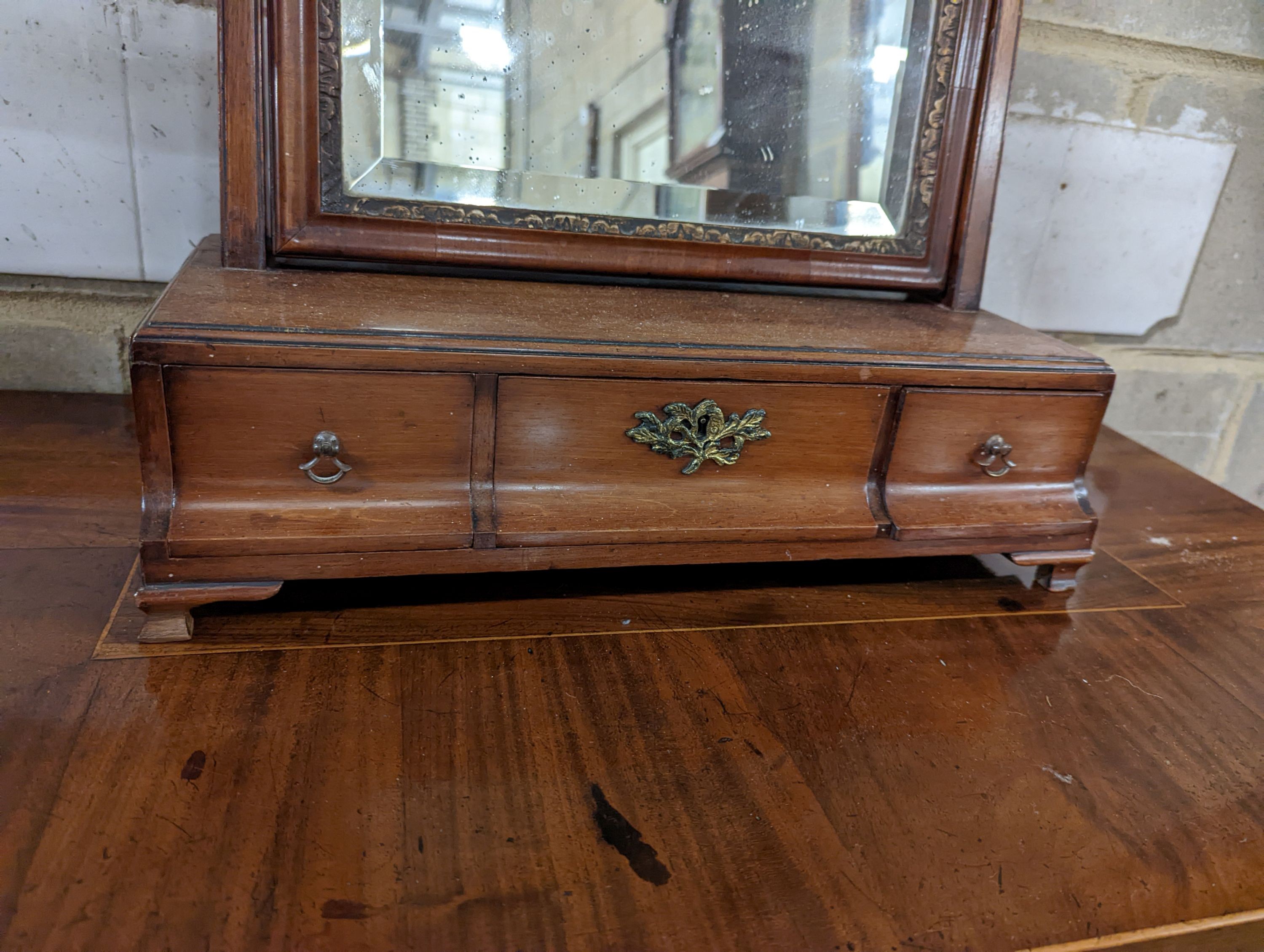 An 18th century mahogany box base toilet mirror, width 43cm, depth 20cm, height 63cm